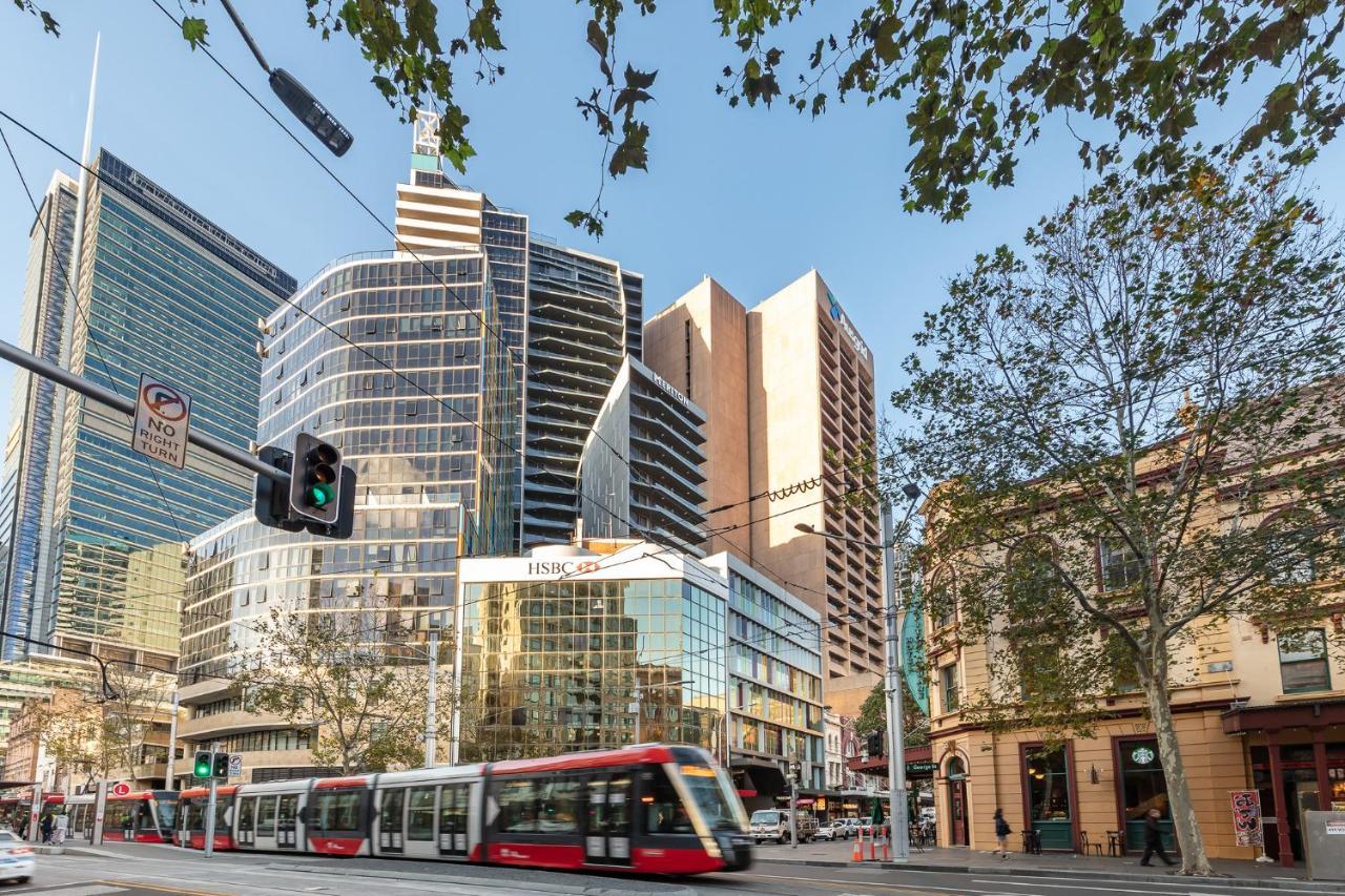 Meriton Suites Campbell Street, Sydney Exterior photo The tram interchange at the corner of Collins and Swanston streets